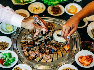 A couple shares Korean BBQ in Aurora CO