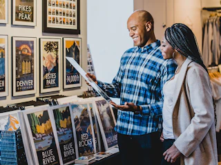 A couple browses the shopping at the LOCAL Southlands in Aurora, Colorado